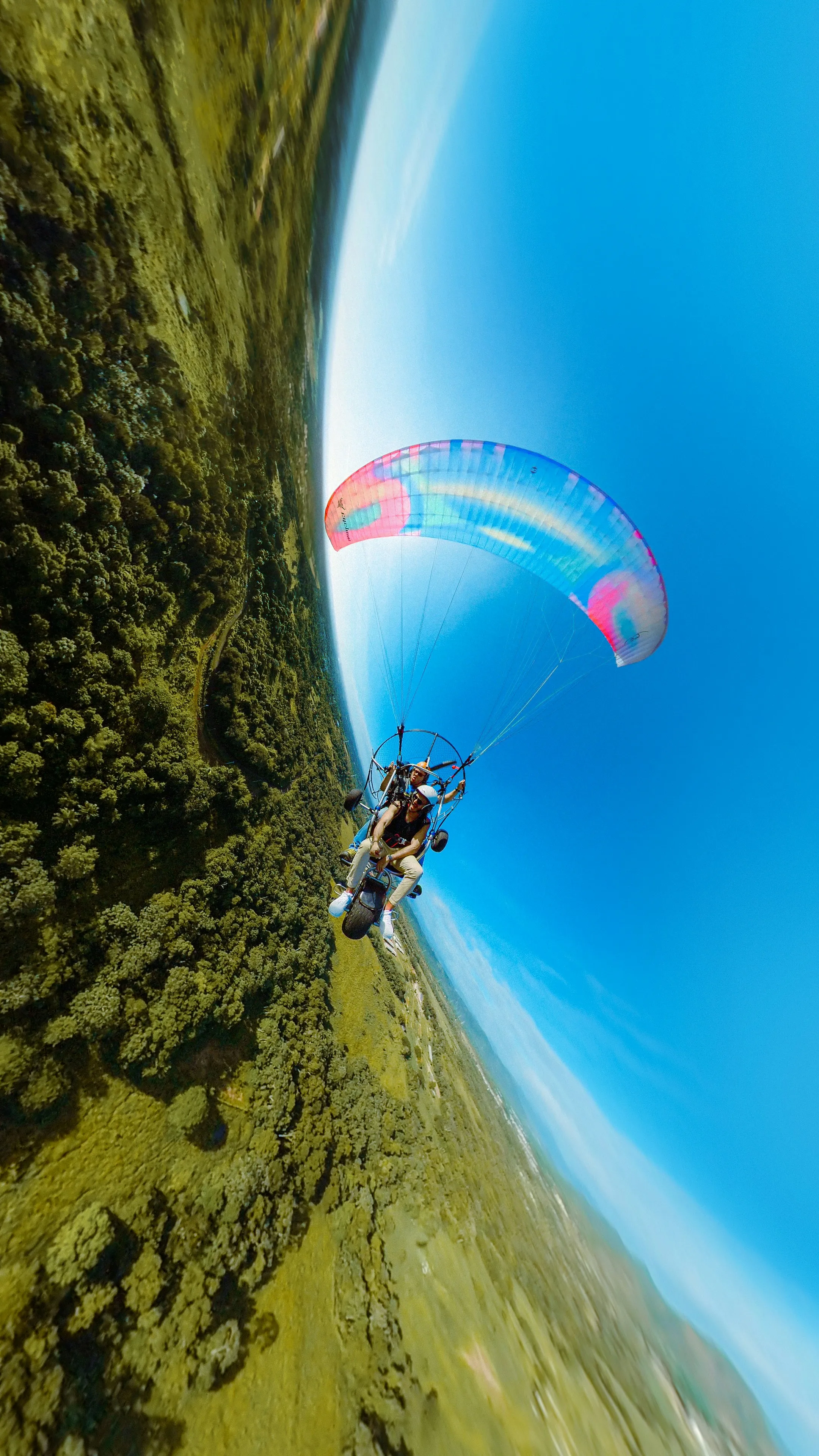 Tandem paratrike in flight